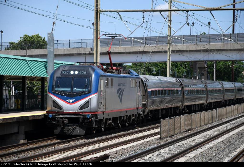 Westbound "Regional" zips through the station